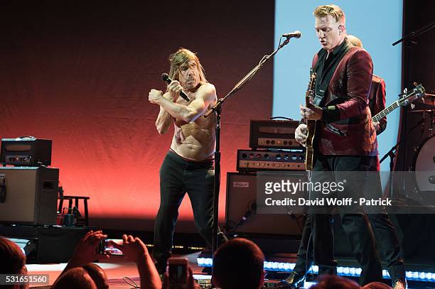 Iggy Pop and Josh Homme from Post Pop Depression perform at Le Grand Rex on May 15, 2016 in Paris, France.