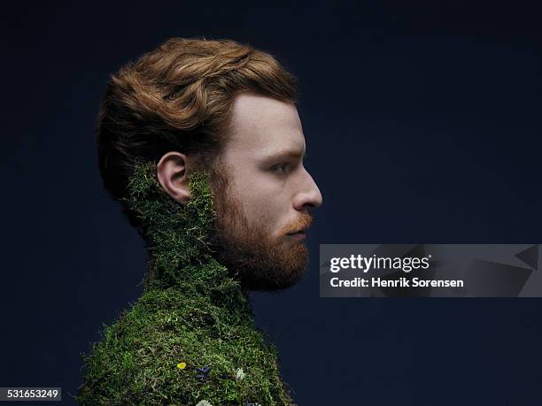 man with moss on his body - overgrown stock pictures, royalty-free photos & images