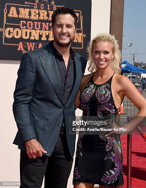 Singer Luke Bryan and wife Caroline Boyer arrive at the 2016 American Country Countdown Awards at The Forum on May 1, 2016 in Inglewood, California.
