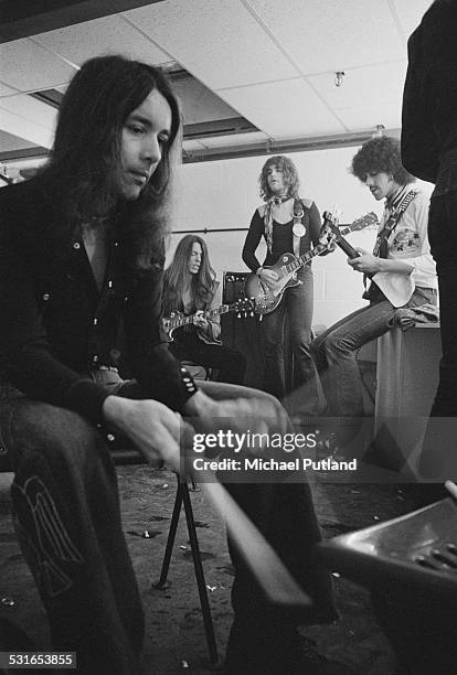 Irish rock group Thin Lizzy, rehearsing backstage in a dressing room at the Roundhouse, London, 3rd November 1974. Left to right: drummer Brian...