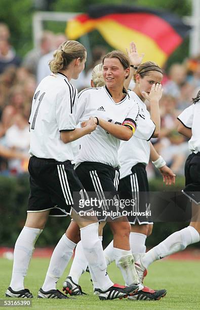 Simone Laudehr and Patricia Hanebeck celebrate Hanebeck's goal during their Under 19 friendly match v Norway on June 29, 2005 in Wetzlar, Germany.
