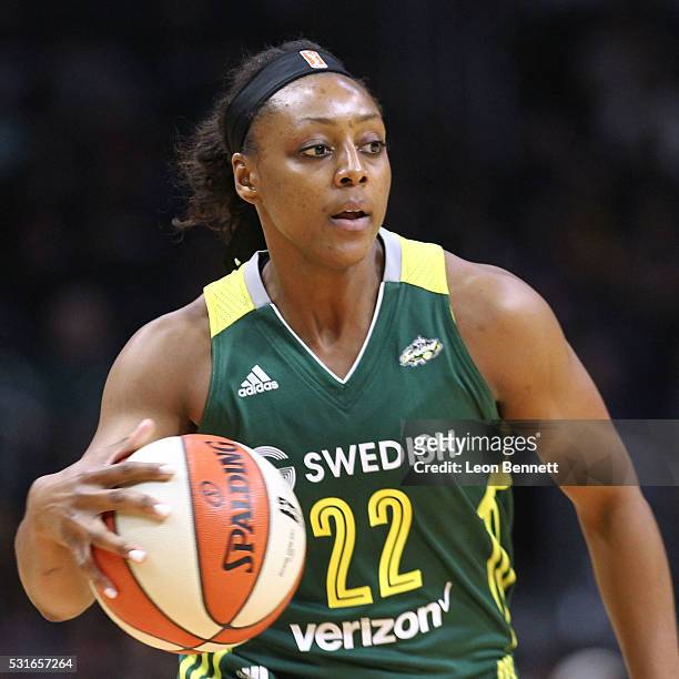 Monica Wright of the Seattle Storm handles the ball against the Los Angeles Sparks during a WNBA basketball game at Staples Center on May 15, 2016 in...
