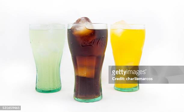 carbonated softdrinks soda drink - fanta stock pictures, royalty-free photos & images