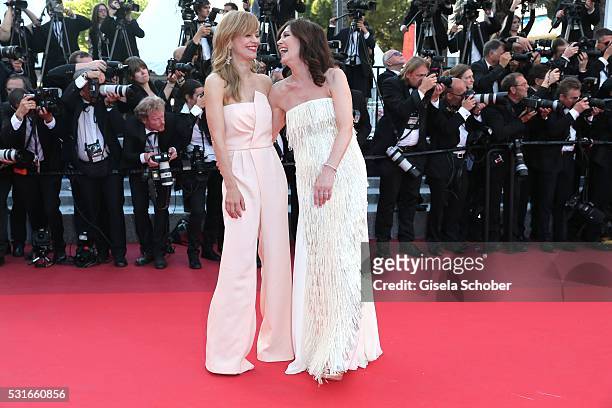 Heike Makatsch, Iris Berben is wearing a white dress by Talbot Runhof during the "From The Land Of The Moon " premiere during the 69th annual Cannes...