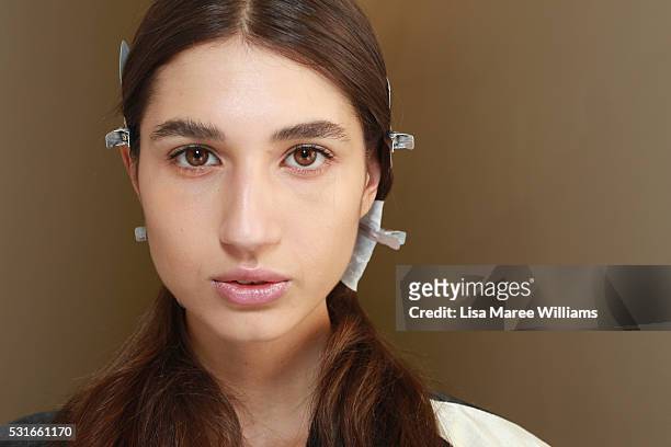 Model poses as she prepares backstage ahead of the Yeojin Bae show at Mercedes-Benz Fashion Week Resort 17 Collections at Carriageworks on May 16,...