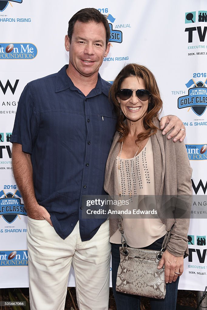 UCLA football coach Jim Mora and his wife Shannon Mora arrive at the... News Photo Getty Images