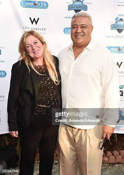 Football coach Kennedy Polamalu and Diane Polamalu arrive at the VIP celebrity cocktail reception for the 10th Annual Jim Mora Celebrity Golf Classic...