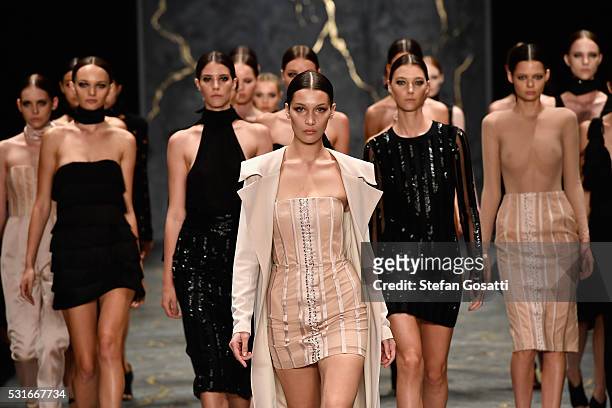 Model Bella Hadid leads models as they walk the runway during the Misha Collection show at Mercedes-Benz Fashion Week Resort 17 Collections at...