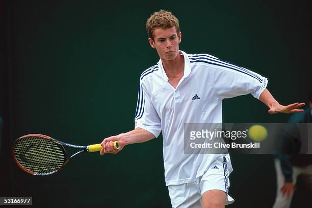 Andrew Murray in action during the Boys Singles during day eight of the Wimbledon Lawn Tennis Championships on July 2, 2005 at the All England Lawn...