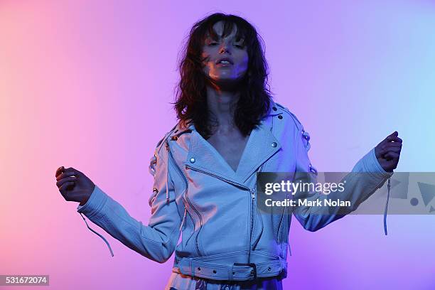 Model poses as she prepares backstage ahead of the Aje show at Mercedes-Benz Fashion Week Resort 17 Collections at Carriageworks on May 16, 2016 in...