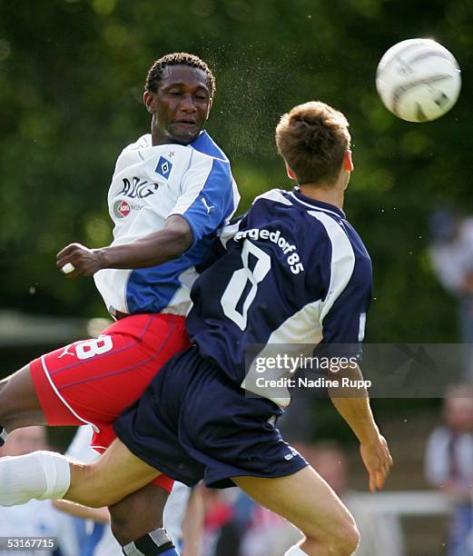 Collin Benjamin of HSV competes with Arne Klein of Bergedorf 85 during the friendly match between Bergedorf 85 and Hamburger SV on June 29, 2005 in...