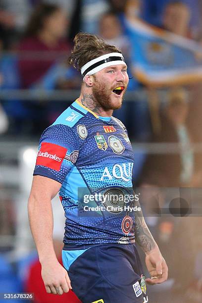 Chris McQueen of the Titans celebrates a try during the round 10 NRL match between the Gold Coast Titans and the Sydney Roosters at Cbus Super...