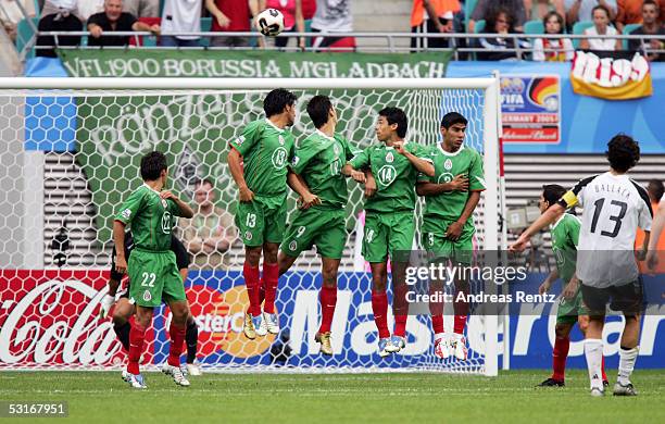 Michael Ballack of Germany scores by free kick against the Mexican wall the seventh goal during the game between Germany and Mexico for the third...