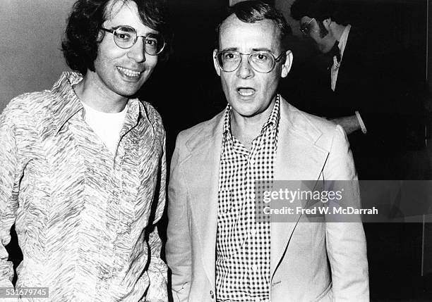 American political strategist Bob Weiner and actor, writer, and director Buck Henry attend a party for the film 'La Grande Bouffe' , New York, New...