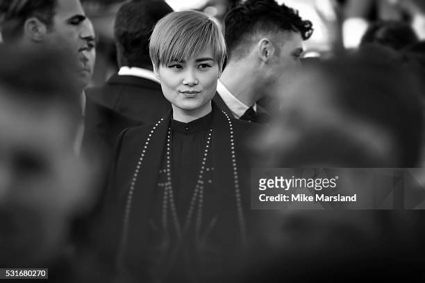 Li Yuchun aka Chris Lee attends the 'From The Land Of The Moon ' premiere during the 69th annual Cannes Film Festival at the Palais des Festivals on...