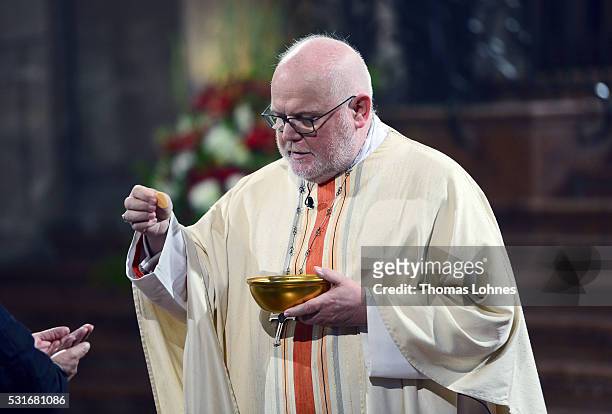 Cardinal Reinhard Marx pictured during a High Mass for Cardinal Karl Lehmann 80th birthday in the cathedral on May 16, 2016 in Mainz, Germany. After...