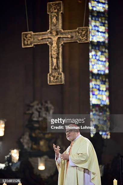 Cardinal Reinhard Marx speaks during a High Mass for Cardinal Karl Lehmann 80th birthday in the cathedral on May 16, 2016 in Mainz, Germany. After...