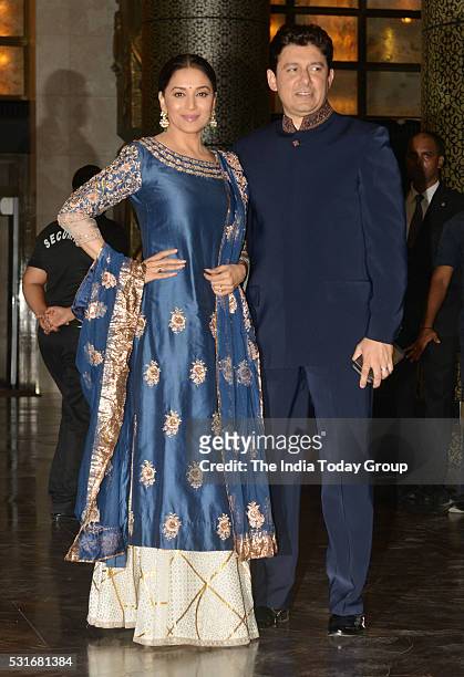 Madhuri Dixit with husband Sriram Madhav at Preity Zinta and Gene Goodenoughs wedding reception ceremony at St. Regis Hotel in Mumbai.