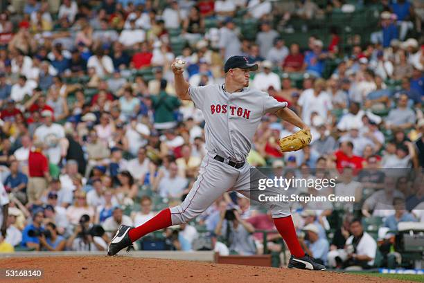 Mike Timlin of the Boston Red Sox pitches during the game against the Chicago Cubs at Wrigley Field on June 10, 2005 in Chicago, Illinois. The Cubs...