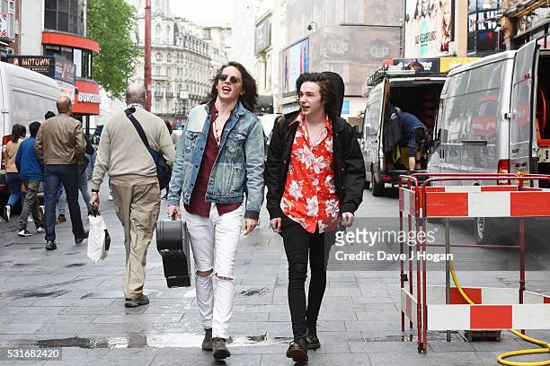 Ferdia Walsh-Peelo and Mark McKenna busking to promote the upcoming film "Sing Street," which is released to theatres May 20th, at Leicester Square...