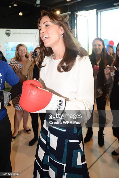 Catherine, Duchess of Cambridge is seen boxing at Queen Elizabeth Olympic Park during the launch of the Heads Together campaign on mental health on...