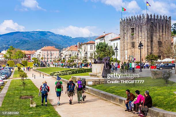 backpackers and tourists travelling in ponte de lima - ponte de lima stock pictures, royalty-free photos & images