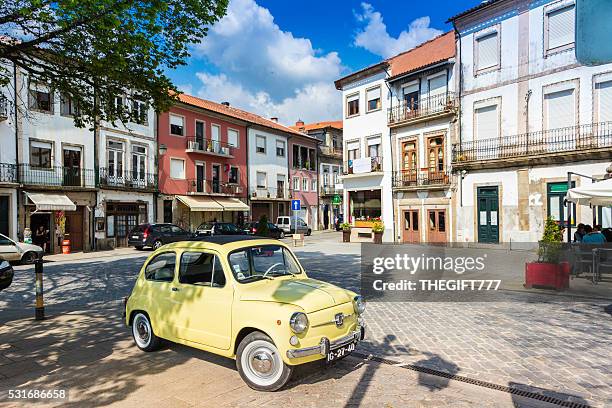 old yellow fiat 500 fully restored in ponte de lima - viana do castelo stockfoto's en -beelden