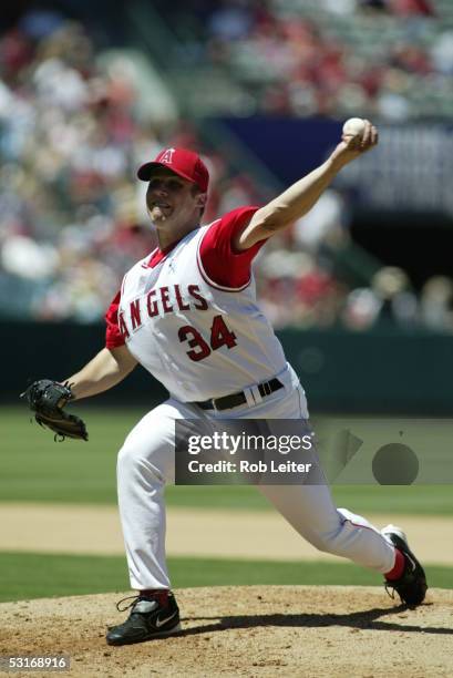 June 19: Jake Woods of the Los Angeles Angels of Anaheim pitches during the game against the Florida Marlins at Angel Stadium on June 19, 2005 in...