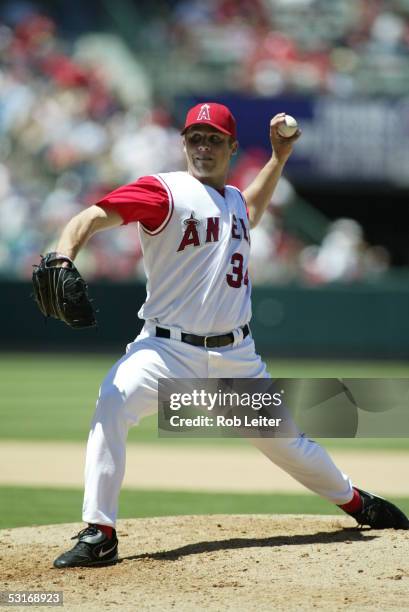 June 19: Jake Woods of the Los Angeles Angels of Anaheim pitches during the game against the Florida Marlins at Angel Stadium on June 19, 2005 in...