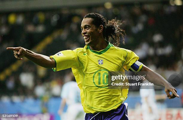 Ronaldinho of Brazil celebrates scoring his team's third goal during the FIFA 2005 Confederations Cup Final between Brazil and Argentina at the...