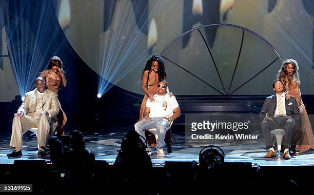 Musical group Destiny's Child, Michelle Williams, Kelly Rowland and Beyonce Knowles perform onstage with Magic Johnson, Nelly and Terrence Howard...