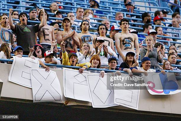 Fans show their support of the Washington Nationals, formerly the Montreal Expos, during their Interleague game against the Toronto Blue Jays at...