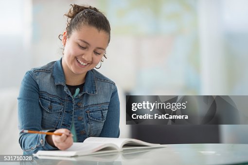 Homework Answer Me Answering Homework Questions After School High-Res Stock Photo - Getty ...