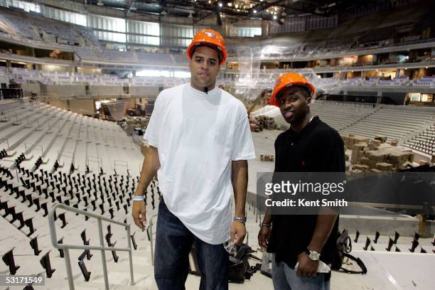 Sean May and Raymond Felton of the Charlotte Bobcats take a look at the New Charlotte Arena on June 29, 2005 in Charlotte, North Carolina. NOTE TO...