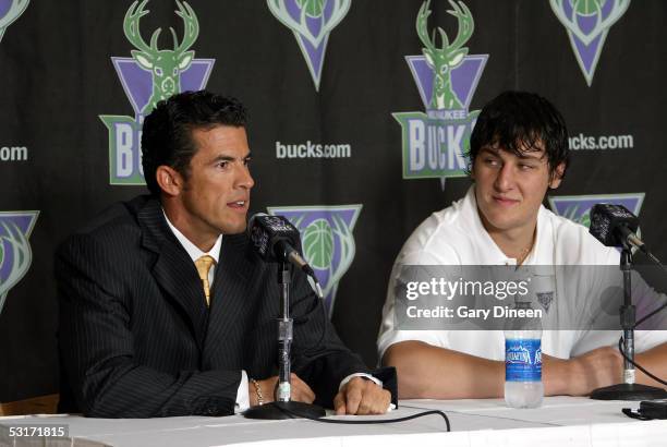 Larry Harris, Milwaukee Bucks General Manager introduces Andrew Bogut, the first pick of the 2005 NBA Draft, to the media during a press conference...