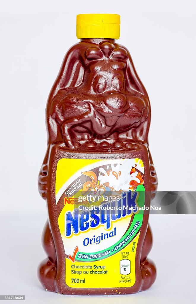 Nesquik chocolate syrup in a bunny shape bottle design. The...