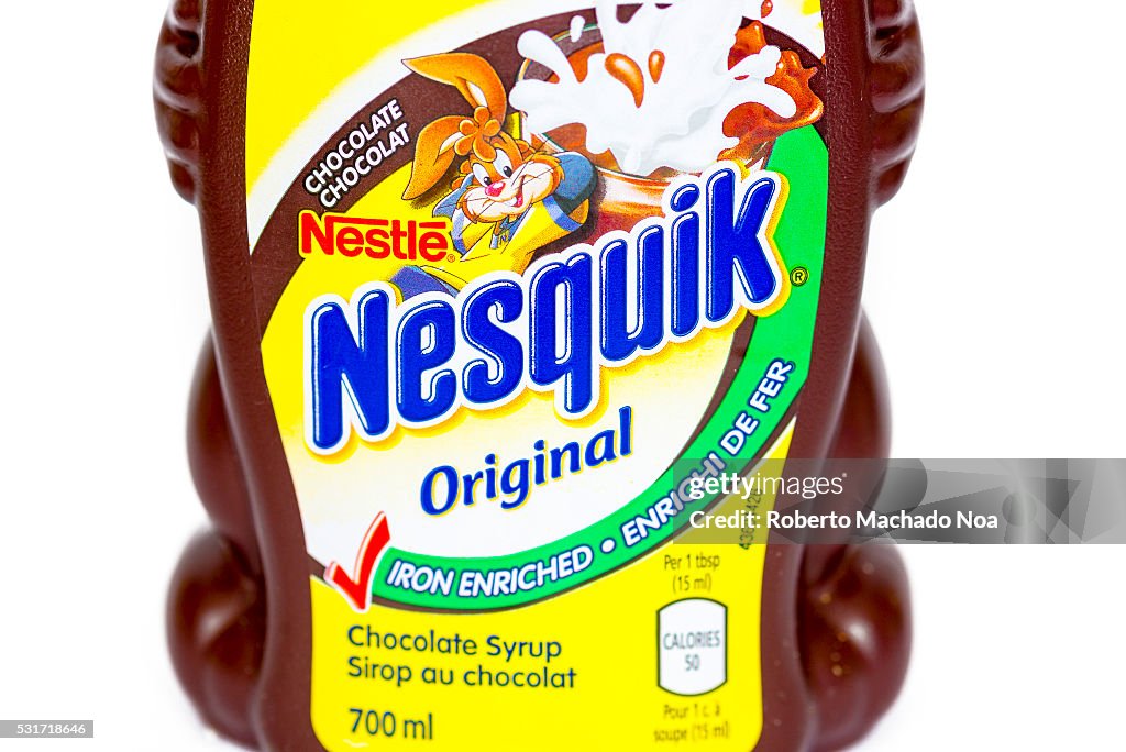 Nesquik chocolate syrup in a bunny shape bottle design. The...