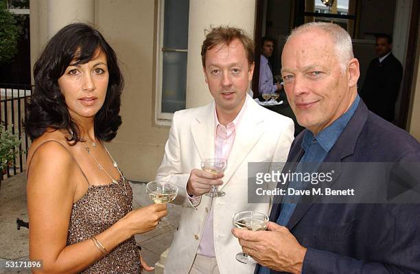 Polly Sampson, Geordie Greig and David Gilmour attend the annual Tatler Summer Party hosted hosted by Tatler editor Geordie Greig and also...