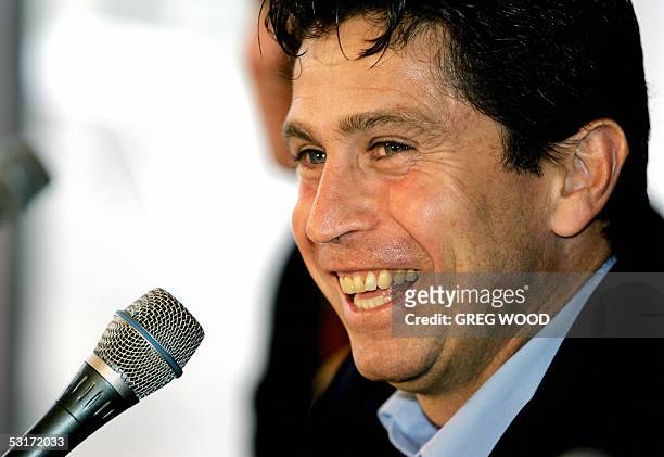 Former Australian football coach Frank Farina laughs as he speaks at a press conference in Sydney, 30 June 2005. Farina, coach for the past six years...