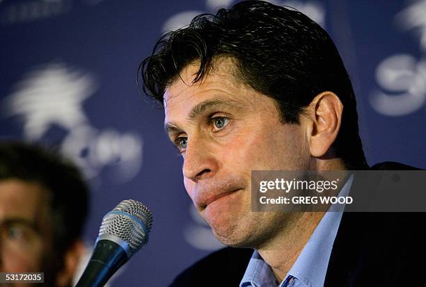 Former Australian football coach Frank Farina is in a serious mood as he speaks at a press conference in Sydney, 30 June 2005. Farina, coach for the...