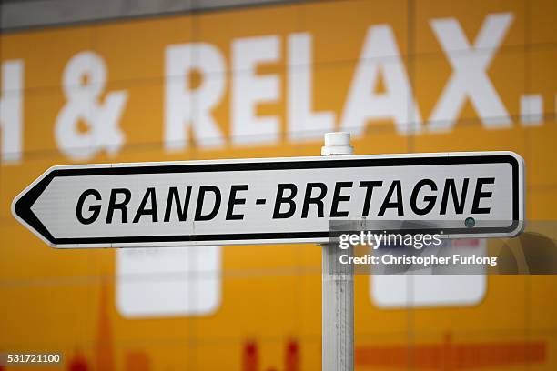 Sign next to shops points the way to Grande Bretagne at the Calais, Tunnel Sous La Manche terminal on May 13, 2016 in Calais, France. The Schengen...