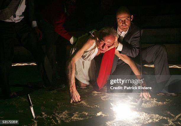 Actor Arthur Dignam and John Leary perform during a photo call for William Shakespeare's Julius Caesar at the Wharf1 Theatre on June 30, 2005 in...