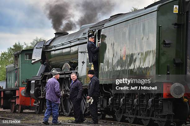 Train crew work on the Flying Scotsman at Bo'ness and Kinneil Railway station on May 16, 2016 in Bo'ness, Scotland. The Flying Scotsman arrived in...