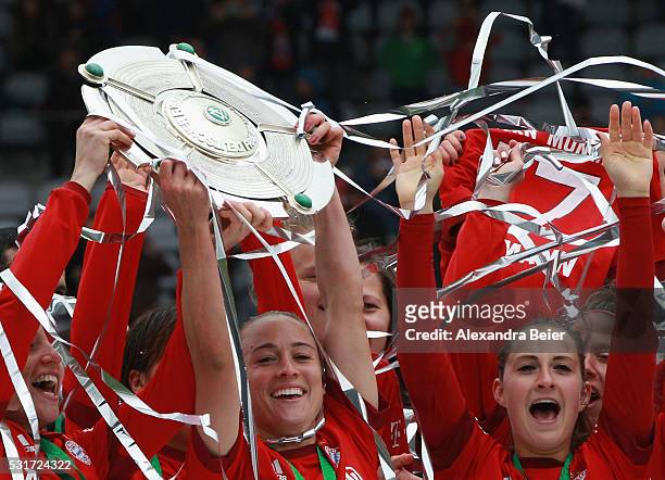 The Bayern Muenchen women team celebrate their German Championship victory holding up the trophy after the women Bundesliga match between FC Bayern...