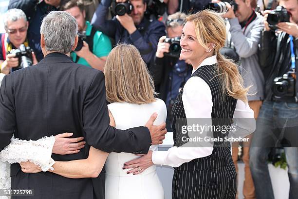 Actors George Clooney and Julia Roberts attend the "Money Monster" photocall during the 69th annual Cannes Film Festival at the Palais des Festivals...