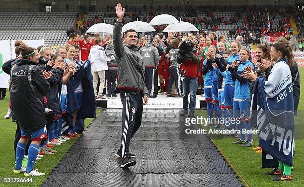 Team coach Thomas Woerle of Bayern Muenchen waves to the fans after his team's victory of the German Championship title after the women Bundesliga...
