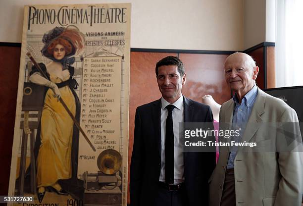 Gilles Jacob and David Lisnard pose for photographers at the Gilles Jacob Auction during the 69th annual Cannes Film Festival at the Martinez Hotel...
