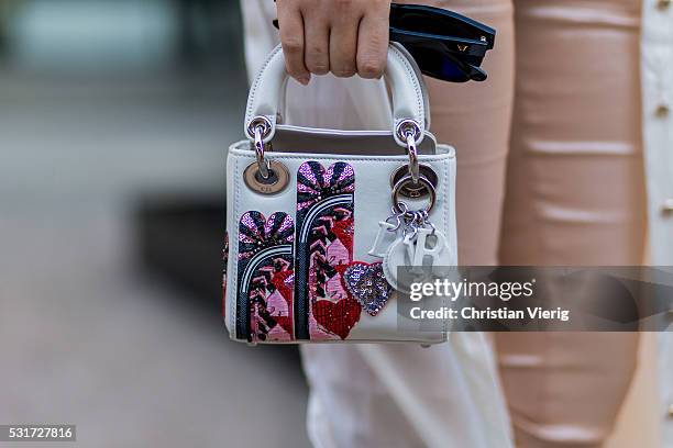 White Dior bag outside Misha Collection at Mercedes-Benz Fashion Week Resort 17 Collections at Carriageworks on May 16, 2016 in Sydney, Australia.