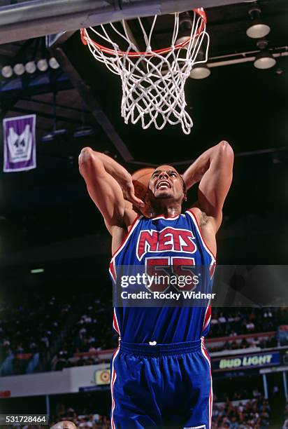 Jayson Williams of the New Jersey Nets dunks the ball during a game against the Sacramento Kings on November 26, 1995 at Arco Arena in Sacramento,...