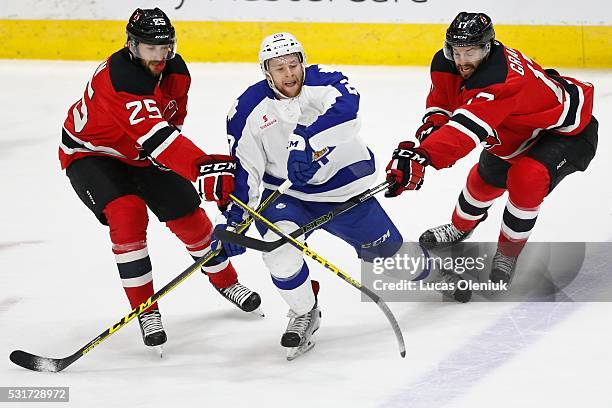 Toronto's Connor Brown .is tripped up by Nick Lappin and Marc-Andre Gragnani in first period action. The Toronto Marlies hosted the Albany Devils at...